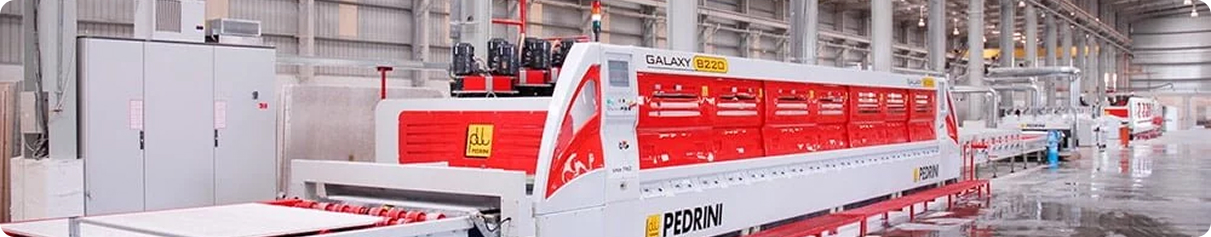 A Pedrini tile production line, manufacturing tiles as thin as 10 mm with a daily capacity ranging from 200 to 2,000 square meters, depending on the required thickness, ensuring precision and quality.